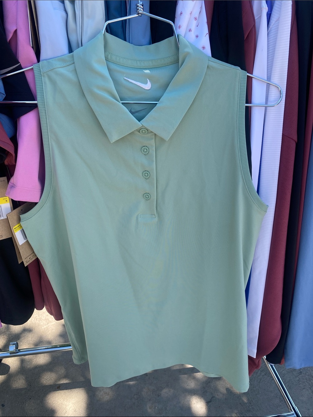 NWT Nike Women’s Sage gree Sleeveless Golf Polo with White Swoosh, small